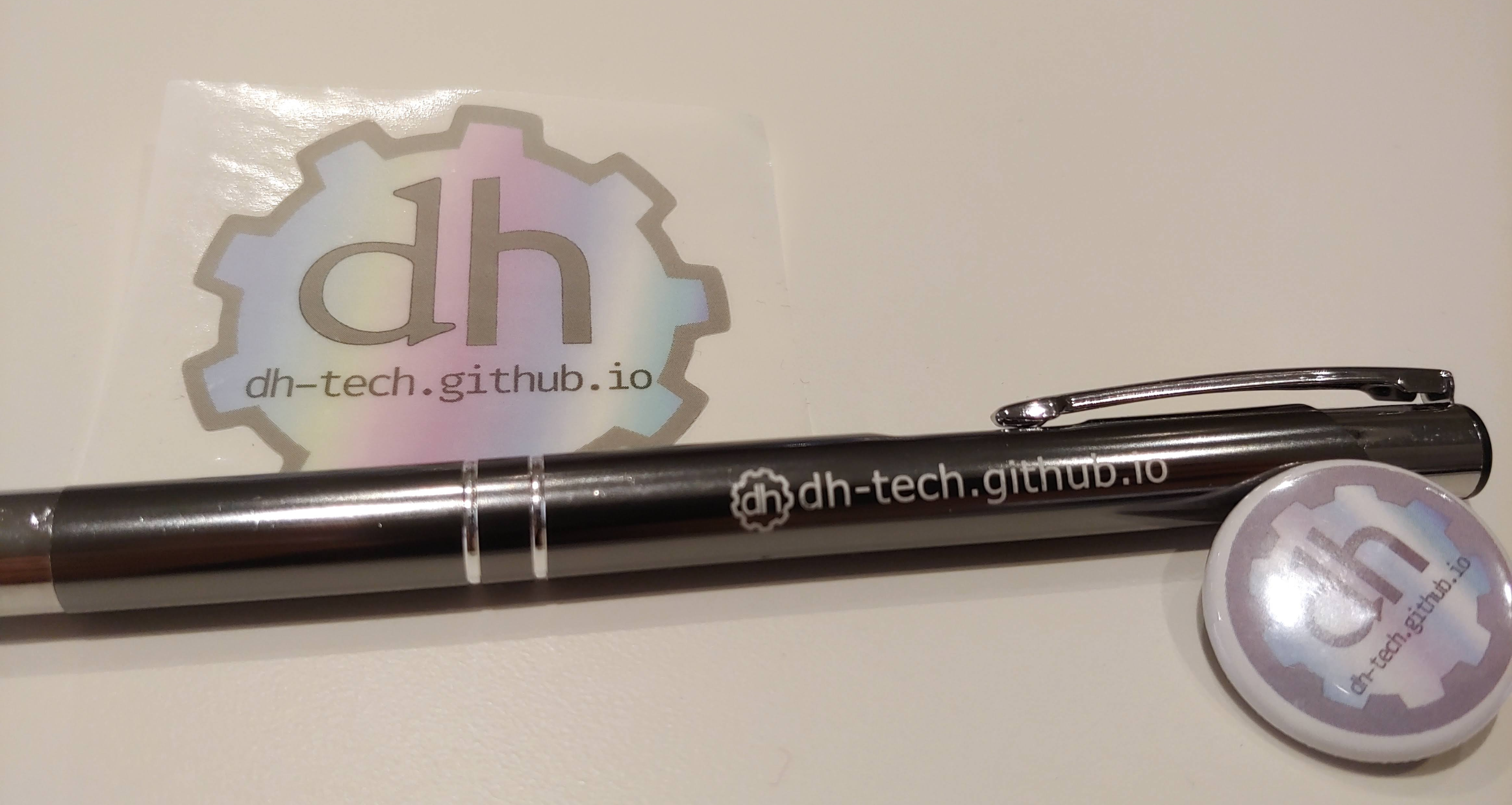 Photo of DHTech swag taken by Rebecca Sutton Koeser photo of a sticker, pen, and pin with variations of new DHtech logo